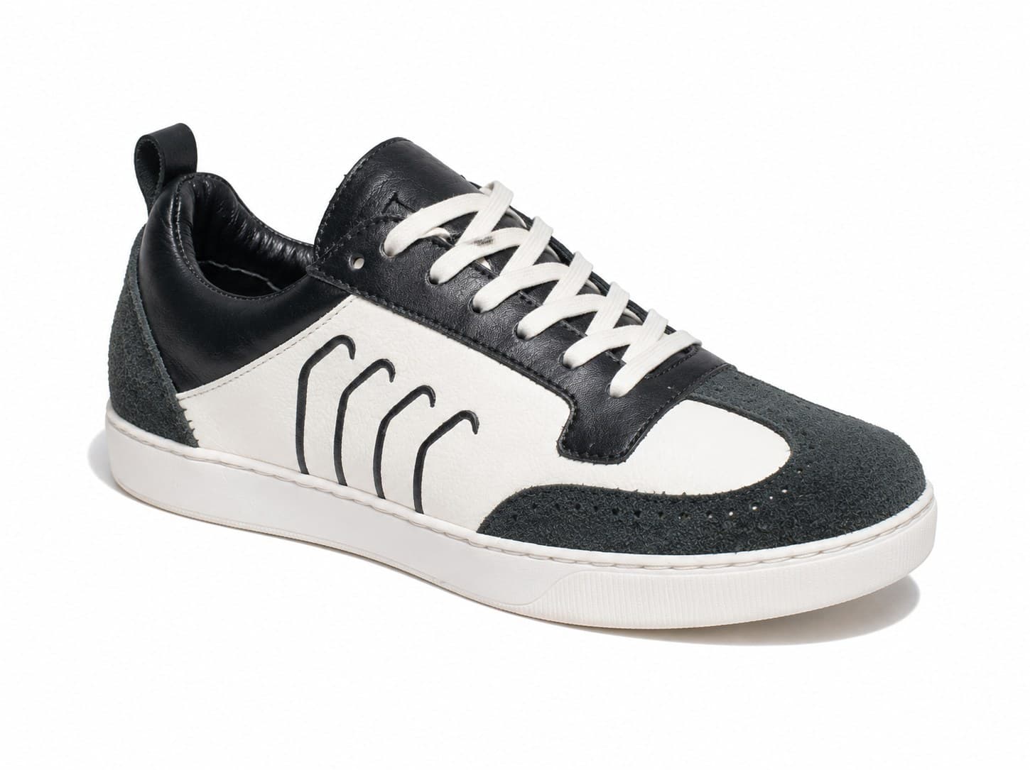 Cadence Low in Spruce Shadow, three-quarter view showing the brogued suede toe